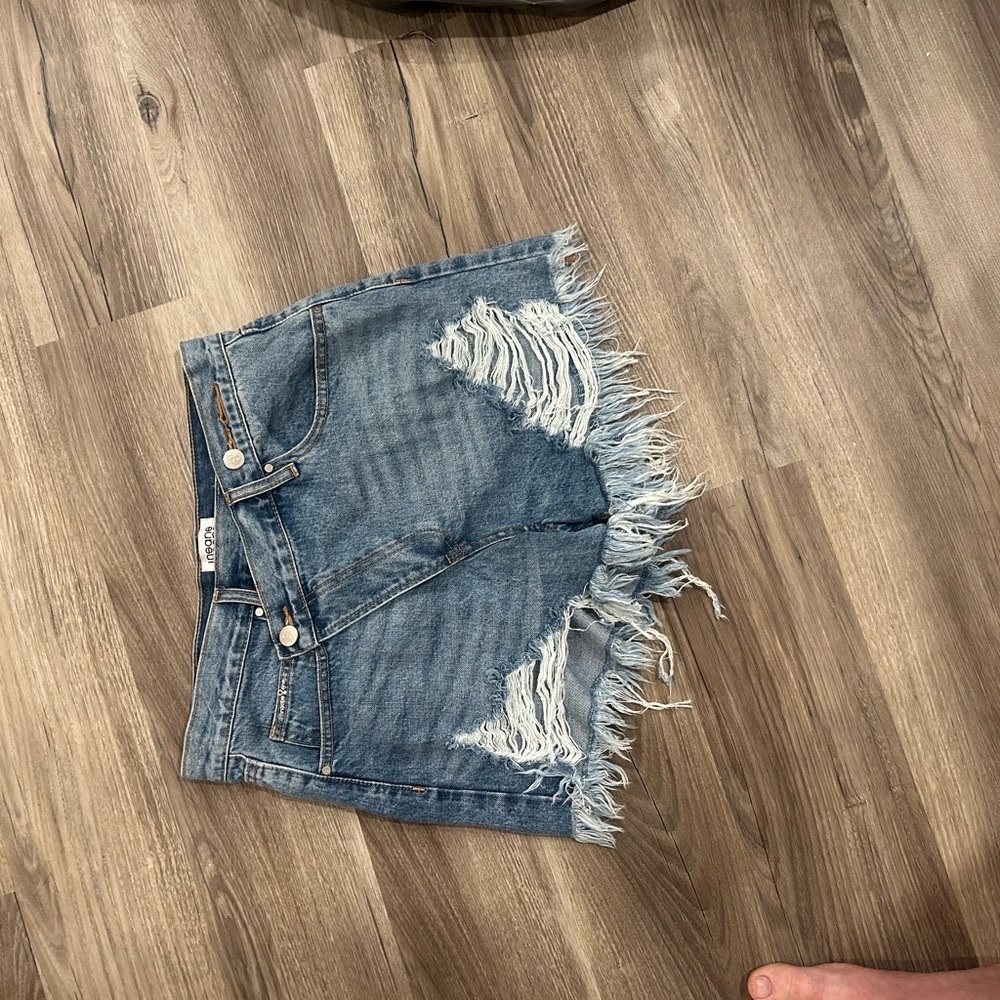 68. Blue and White High-Waisted Jean Shorts with Distressed Detailing - Picture 2 of 6